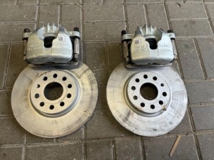 VW TIGUAN III zaciski tarcze 5WA615301B ORYG NOWE