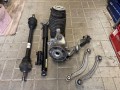 Mercedes 213 257 CLS Zwrotnica lewa Wahacze Amor tył kpl